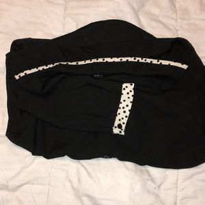 black blouse with polka dot detailing